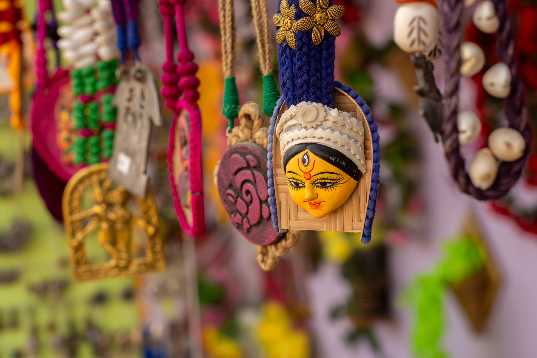 Beautiful Bengali traditional jewelery, works of handicraft, for sale during Handicraft Fair in Kolkata. Selective focus.